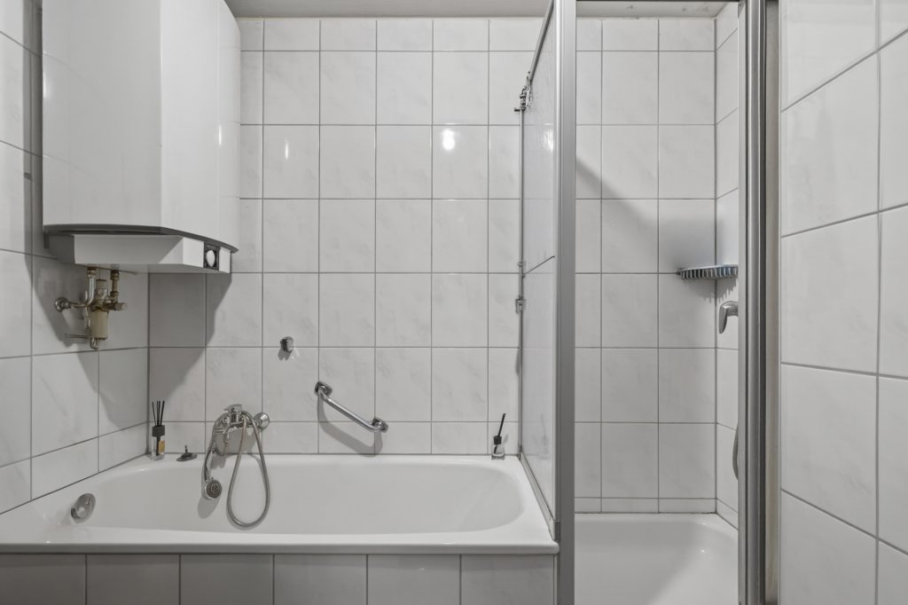 HUST Immobilien GmbH & Co. KG - Immobilienangebot - Karlsruhe - Alle - Solide Kapitalanlage: Langjährig vermietete 4-Zimmer-Wohnung in Karlsruhe-Grötzingen