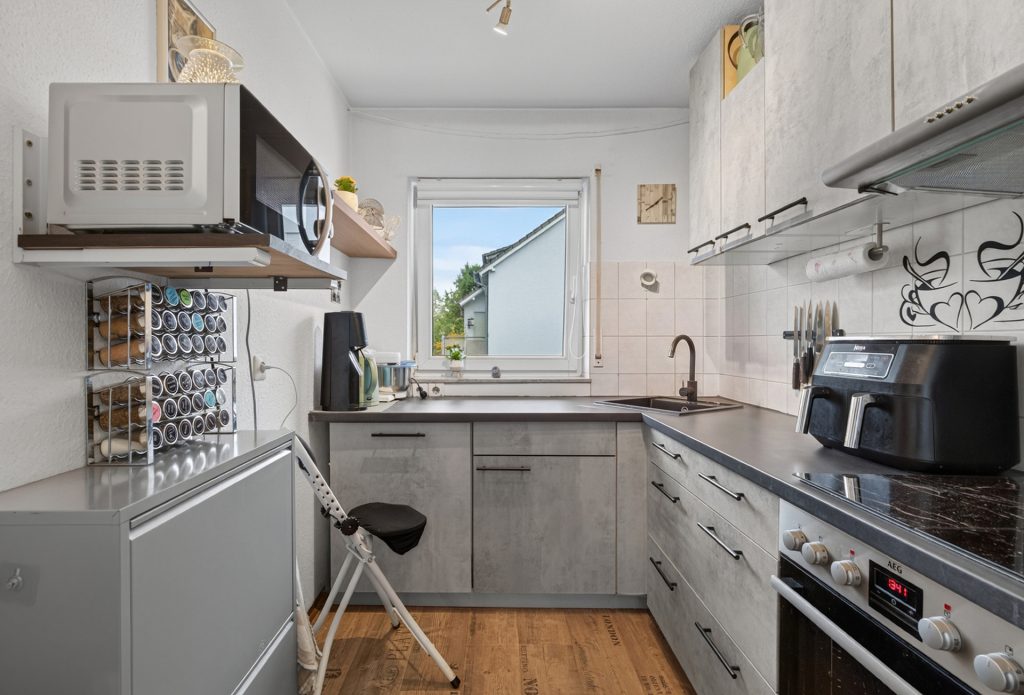 HUST Immobilien GmbH & Co. KG - Immobilienangebot - Eggenstein-Leopoldshafen - Wohnungen - Vermietete 2-Zimmer-Wohnung mit Balkon, Stellplatz und Keller – Kapitalanlage in Eggenstein-Leopoldshafen