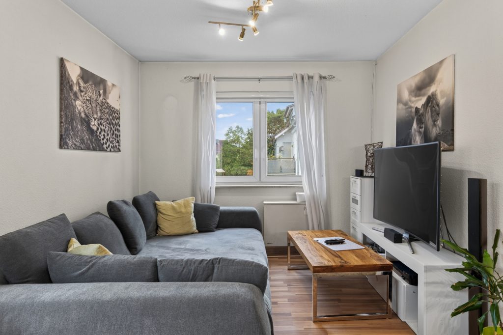 HUST Immobilien GmbH & Co. KG - Immobilienangebot - Eggenstein-Leopoldshafen - Wohnungen - Vermietete 2-Zimmer-Wohnung mit Balkon, Stellplatz und Keller – Kapitalanlage in Eggenstein-Leopoldshafen