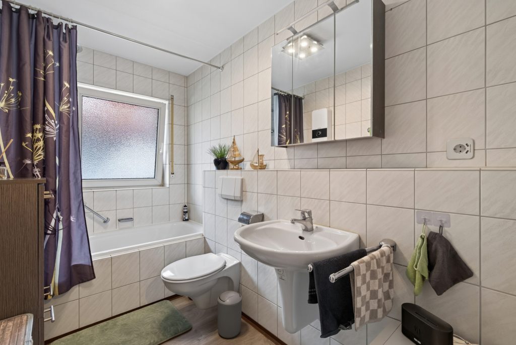 HUST Immobilien GmbH & Co. KG - Immobilienangebot - Eggenstein-Leopoldshafen - Wohnungen - Vermietete 2-Zimmer-Wohnung mit Balkon, Stellplatz und Keller – Kapitalanlage in Eggenstein-Leopoldshafen
