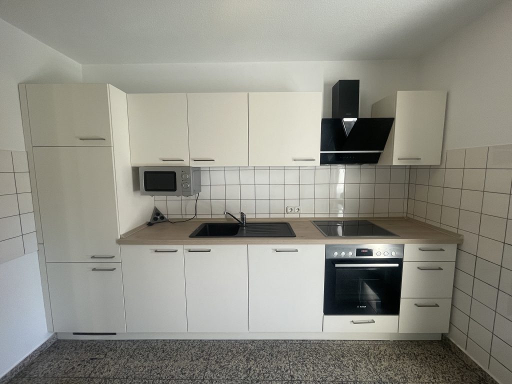 HUST Immobilien GmbH & Co. KG - Immobilienangebot - Karlsruhe / Aue - Alle - Viel Platz zum Wohlfühlen: Charmante 4-Zimmer-Maisonette mit Garten und Tiefgarage in Durlach-Aue