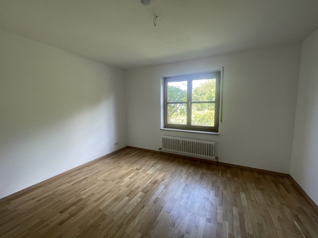 HUST Immobilien GmbH & Co. KG - Immobilienangebot - Karlsruhe / Aue - Alle - Viel Platz zum Wohlfühlen: Charmante 4-Zimmer-Maisonette mit Garten und Tiefgarage in Durlach-Aue