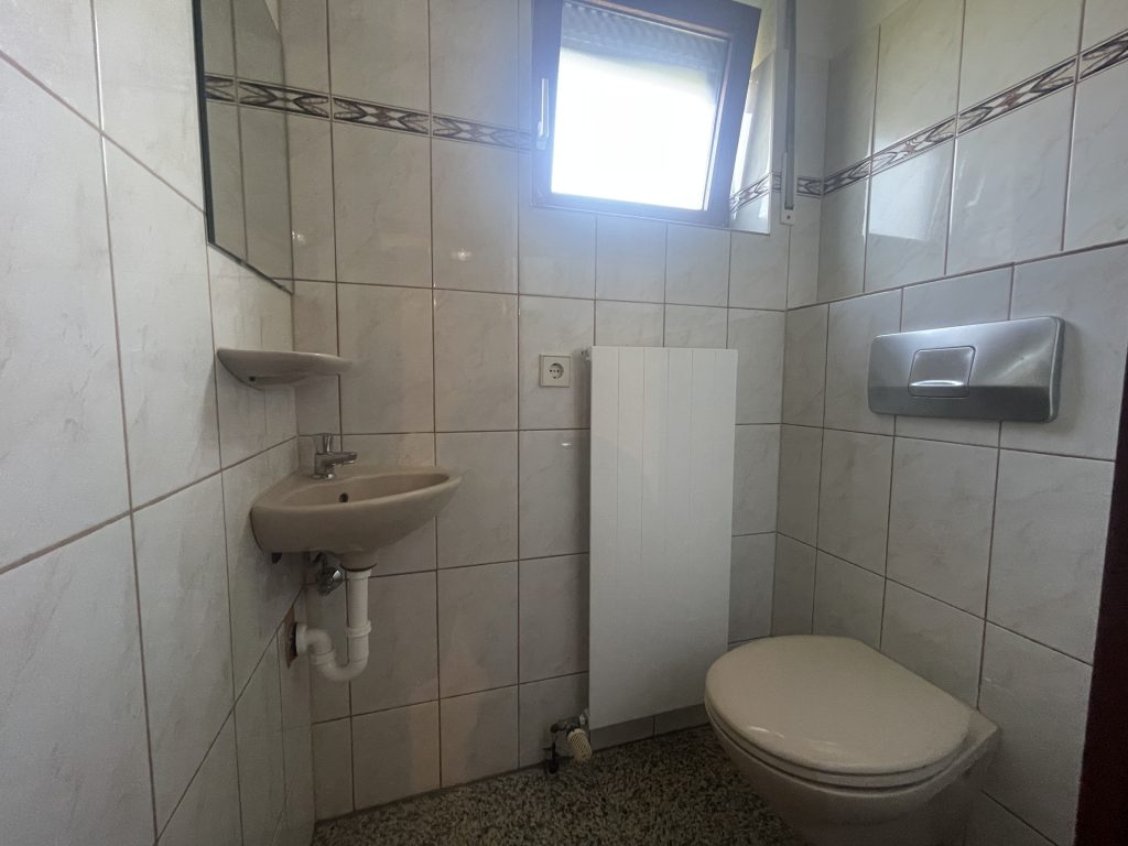 HUST Immobilien GmbH & Co. KG - Immobilienangebot - Karlsruhe / Aue - Alle - Viel Platz zum Wohlfühlen: Charmante 4-Zimmer-Maisonette mit Garten und Tiefgarage in Durlach-Aue
