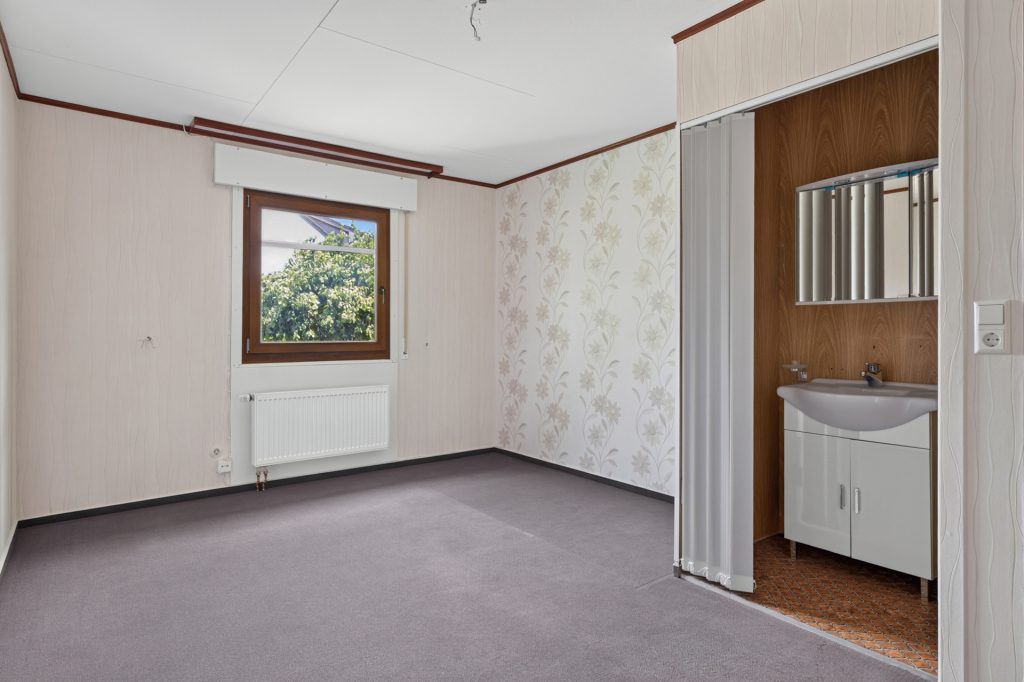 HUST Immobilien GmbH & Co. KG - Immobilienangebot - Eggenstein-Leopoldshafen - Alle - Viel Platz für die Familie: Haus mit Garten und Garage auf Eckgrundstück in Eggenstein