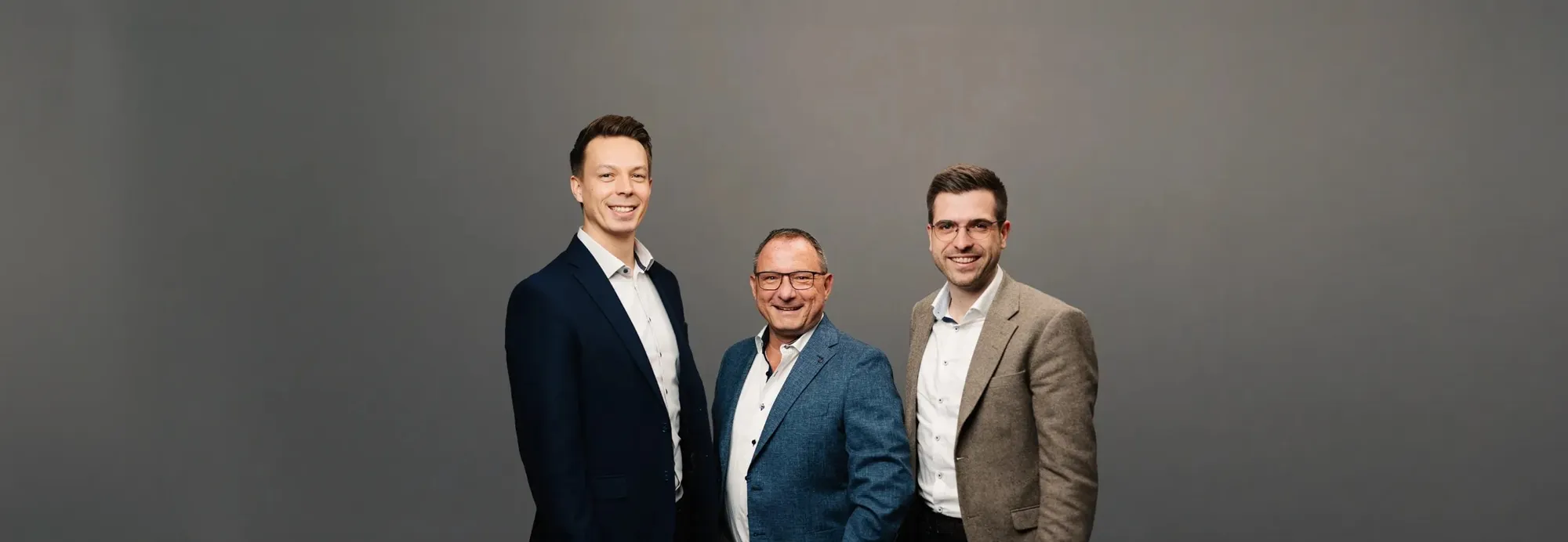 HUST Immobilien - Home Slider - Teambild 2026