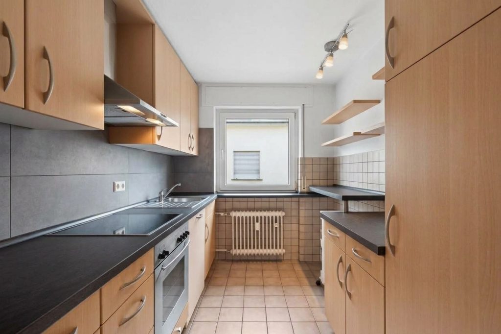 HUST Immobilien GmbH & Co. KG - Immobilienangebot - Karlsruhe - Wohnungen - Charmante, vermietete 3-Zi.-Whg. mit zwei Balkonen und Garage in Weiherfeld