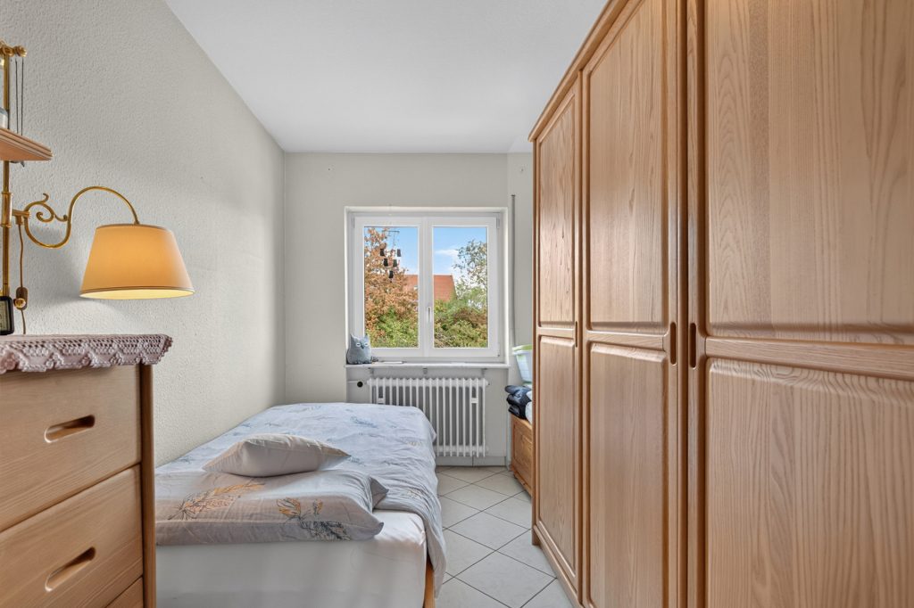 HUST Immobilien GmbH & Co. KG - Immobilienangebot - Stutensee / Büchig - Wohnungen - 3-Zimmer-Wohnung im 1. OG mit Balkon und Stellplatz in Stutensee-Büchig