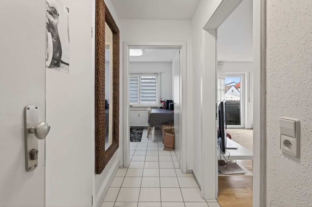 HUST Immobilien GmbH & Co. KG - Immobilienangebot - Karlsruhe / Neureut - Häuser - 4,79 % Rendite: vollvermietetes Mehrfamilienhaus mit 8 Wohnungen und 4 Garagen in Karlsruhe-Neureut