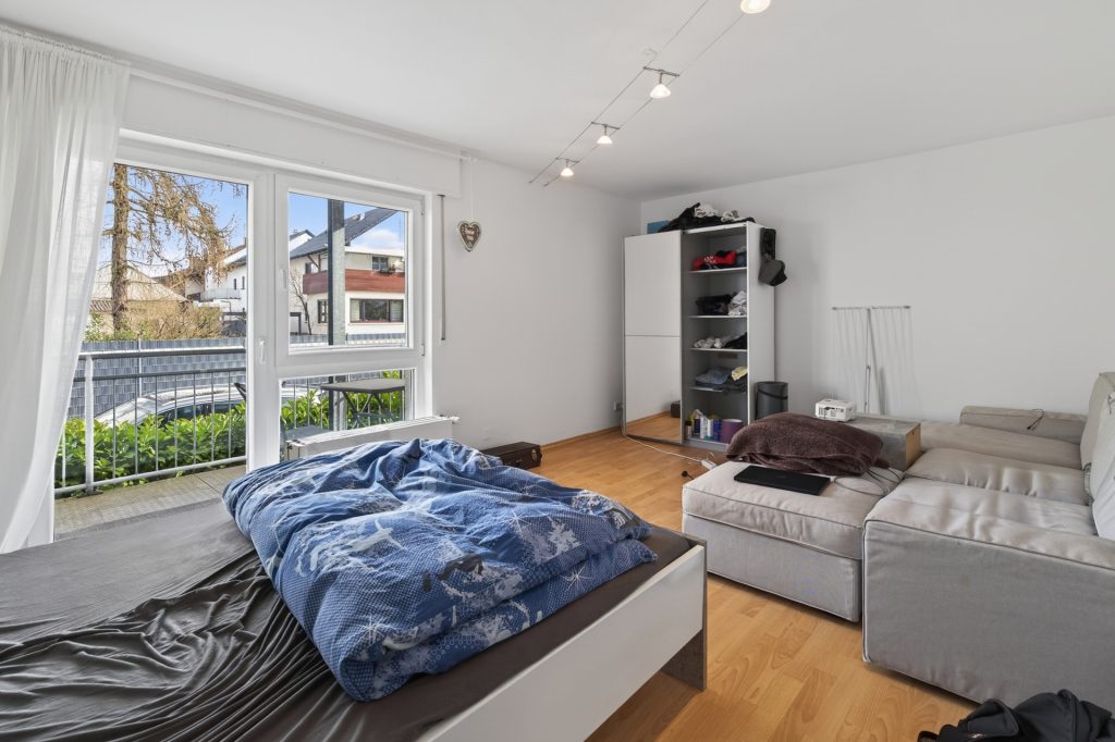 HUST Immobilien GmbH & Co. KG - Immobilienangebot - Karlsruhe / Neureut - Häuser - 4,79 % Rendite: vollvermietetes Mehrfamilienhaus mit 8 Wohnungen und 4 Garagen in Karlsruhe-Neureut