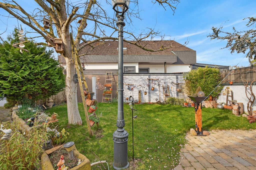 HUST Immobilien GmbH & Co. KG - Immobilienangebot - Muggensturm - Wohnungen - Einziehen und wohlfühlen: Ruhige Erdgeschosswohnung mit Gartenanteil und Garage in Muggensturm