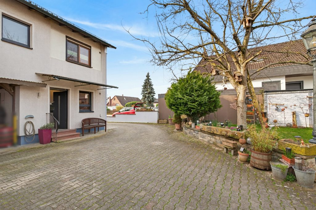 HUST Immobilien GmbH & Co. KG - Immobilienangebot - Muggensturm - Wohnungen - Einziehen und wohlfühlen: Ruhige Erdgeschosswohnung mit Gartenanteil und Garage in Muggensturm