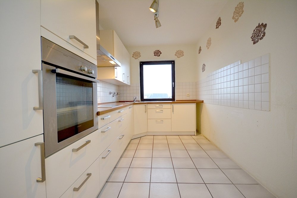 Gütelhöfer Immobilien - Immobilienangebot - Meckenheim - Alle - Über den Dächern von Meckenheim! Penthouse mit offenem Kamin, Einbauküche und 62m² Dachterrasse