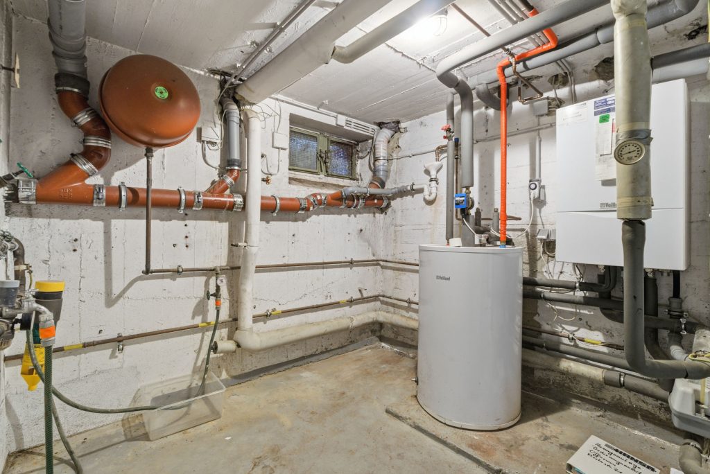 Gütelhöfer Immobilien - Immobilienangebot - Meckenheim - Alle - Multifunktionales Ein- oder Mehrfamilienhaus mit ehemaliger Praxis und viel Potenzial in Top-Lage
