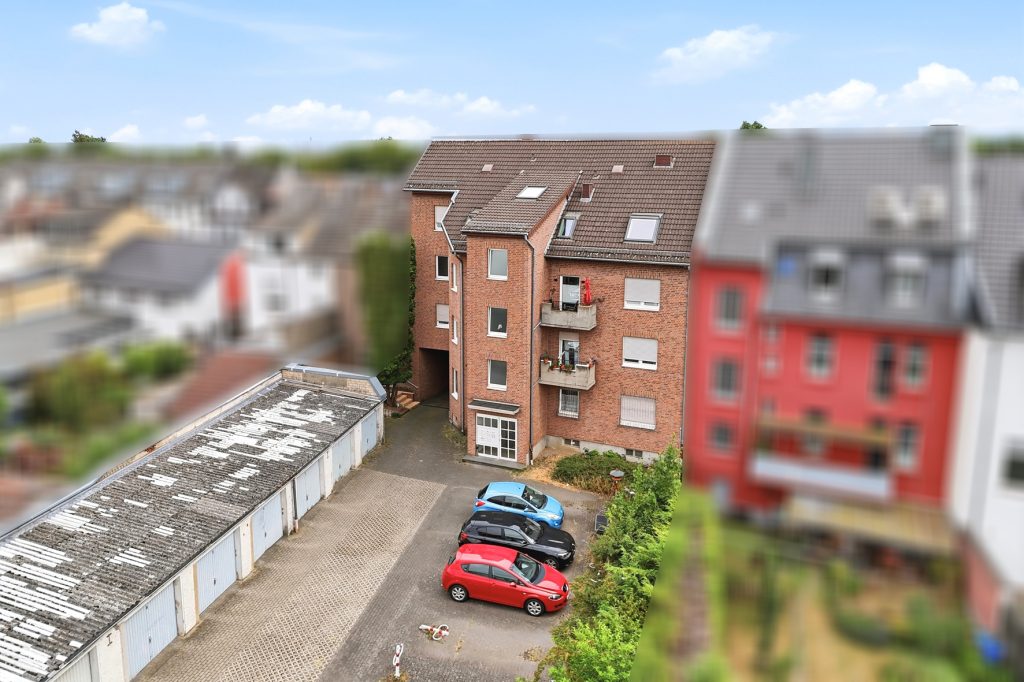 Gütelhöfer Immobilien - Immobilienangebot - Euskirchen - Alle - Investmentpaket mit 7 Eigentumswohnungen, 9 Stellplätzen und Entwicklungspotenzial in Euskirchen