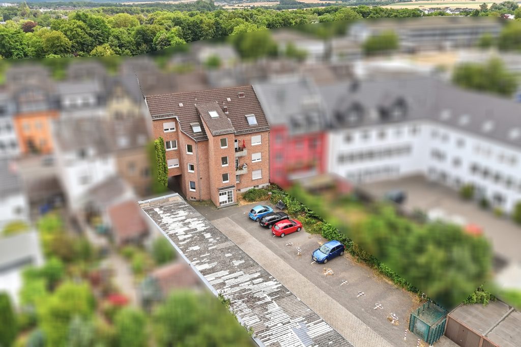 Gütelhöfer Immobilien - Immobilienangebot - Euskirchen - Alle - Investmentpaket mit 7 Eigentumswohnungen, 9 Stellplätzen und Entwicklungspotenzial in Euskirchen