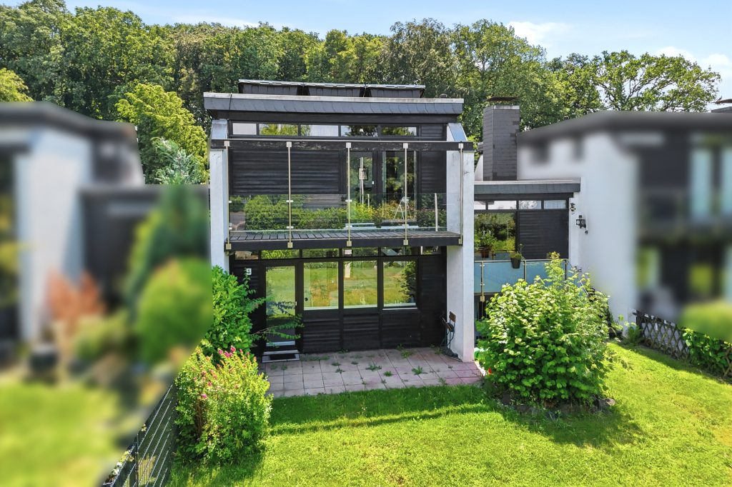 Gütelhöfer Immobilien - Immobilienangebot - Meckenheim / Merl - Alle - Lichtdurchfluteter Split-Level-Wohntraum mit PV Anlage, zwei Terrassen, offenem Kamin und Garage