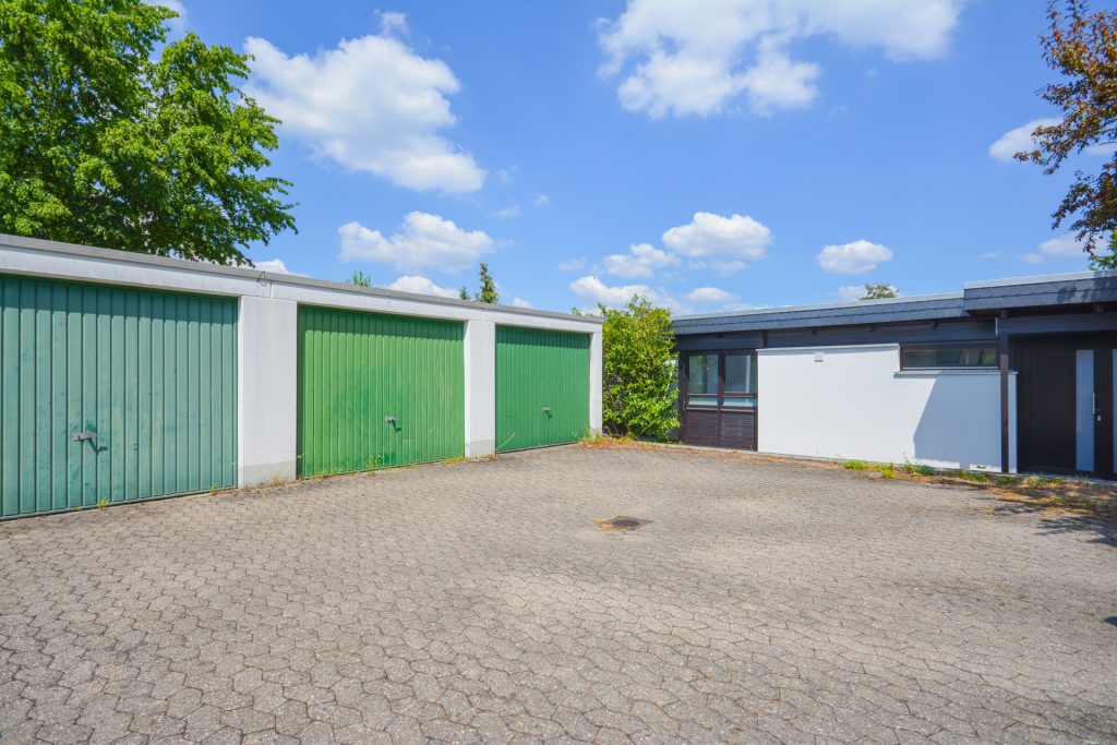 Gütelhöfer Immobilien - Immobilienangebot - Meckenheim / Merl - Alle - Lichtdurchfluteter Split-Level-Wohntraum mit PV Anlage, zwei Terrassen, offenem Kamin und Garage
