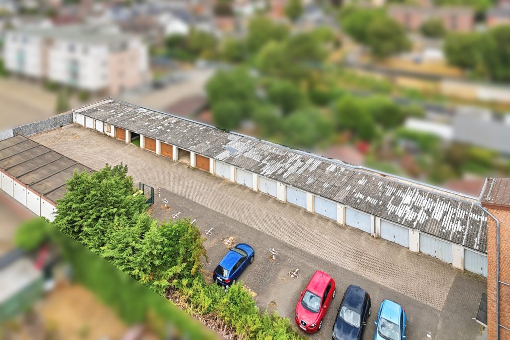Gütelhöfer Immobilien - Immobilienangebot - Euskirchen - Alle - Seltene Kapitalanlage mit Entwicklungspotential! Zweifamilienhaus mit 27 vermieteten Garagen