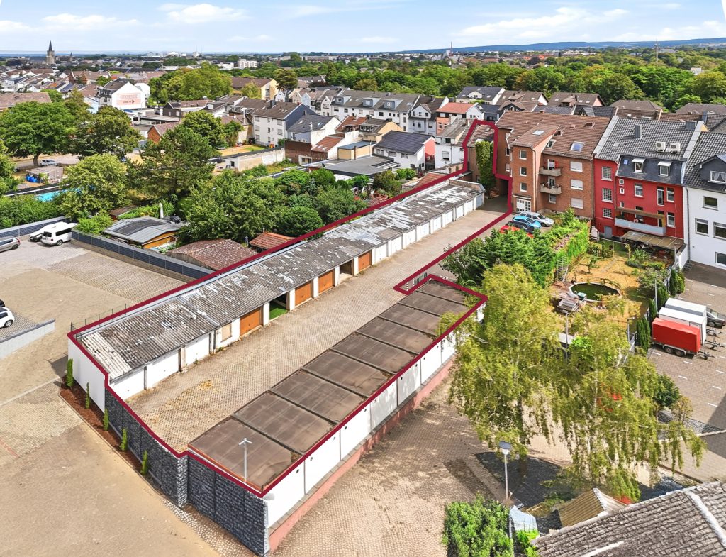 Gütelhöfer Immobilien - Immobilienangebot - Euskirchen - Alle - Seltene Kapitalanlage mit Entwicklungspotential! Zweifamilienhaus mit 27 vermieteten Garagen