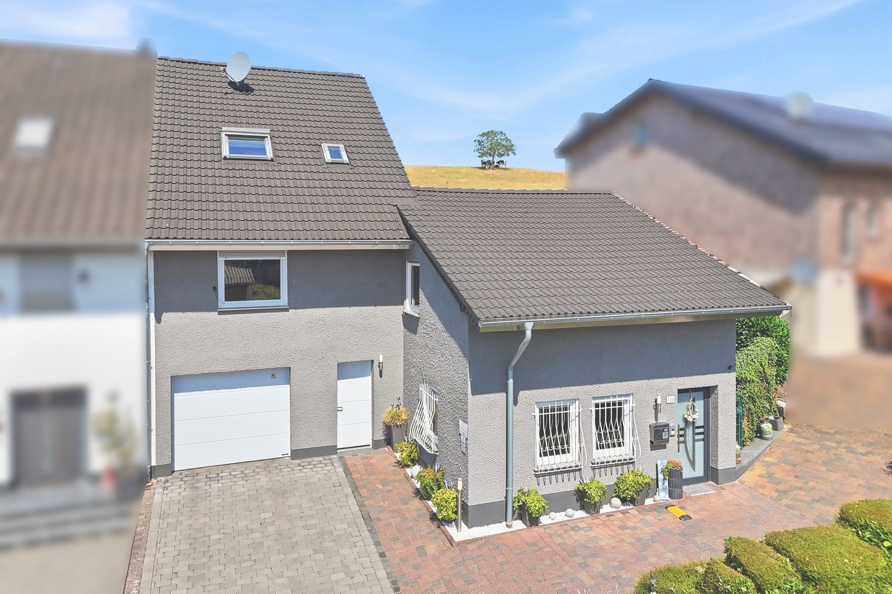Gütelhöfer Immobilien - Immobilienangebot - Mechernich / Floisdorf - Alle - Ländlich eingebettete und modernisierte Doppelhaushälfte mit Garage, Kaminofen und Einbauküche