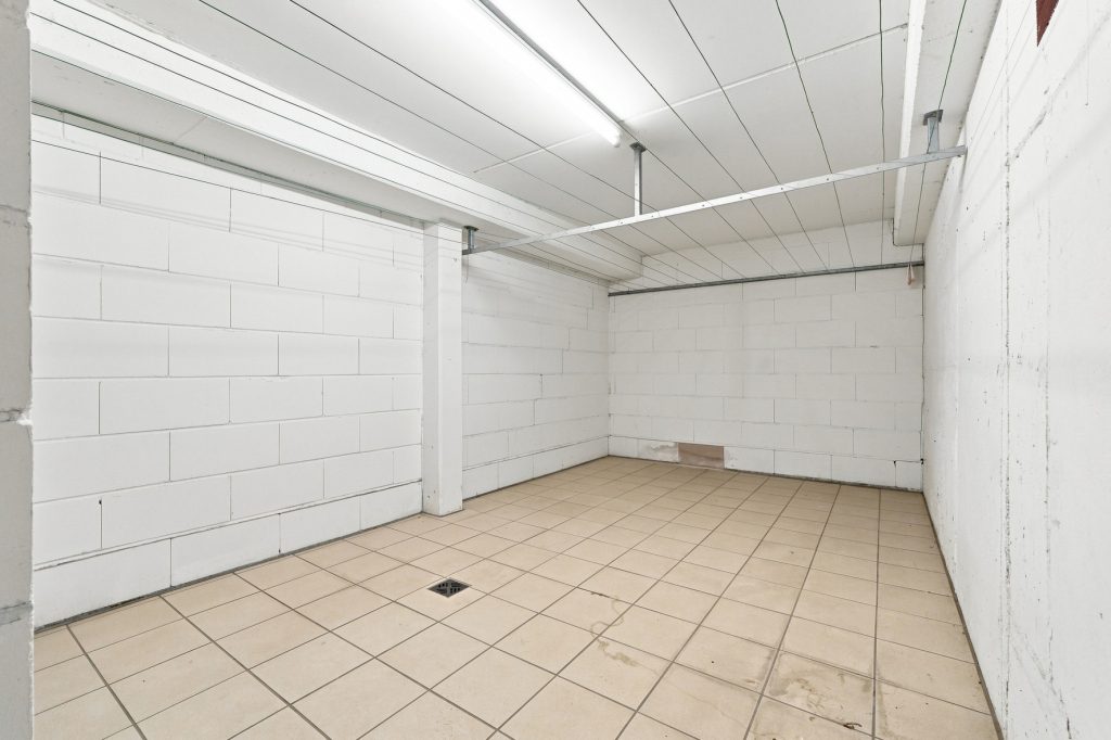 Gütelhöfer Immobilien - Immobilienangebot - Brühl - Alle - Bezugsfreie und stilvolle Erdgeschosswohnung mit Garten, Fußbodenheizung und Tiefgaragenstellplatz