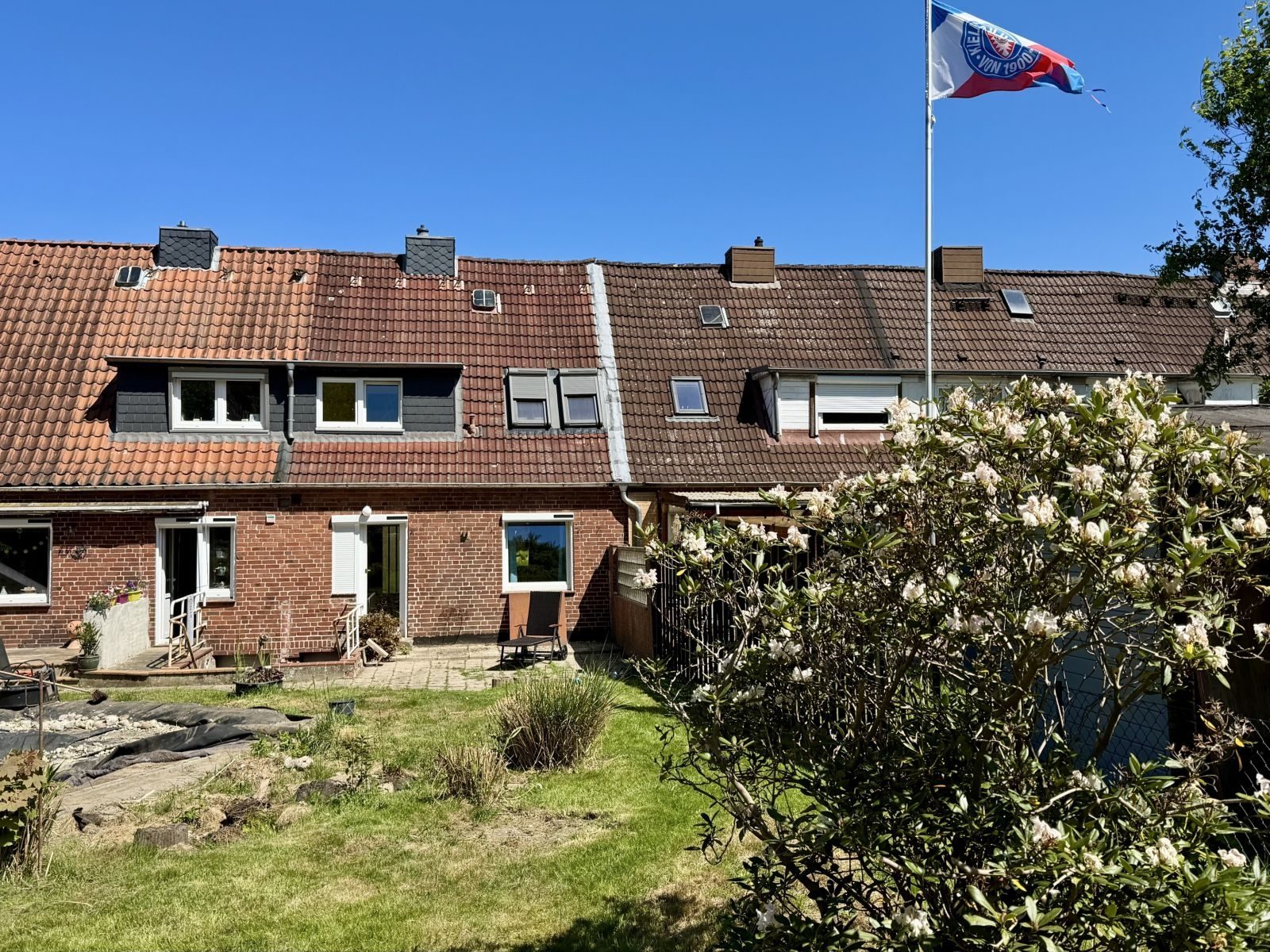 Immobilienangebot - Kiel / Wellingdorf - Alle - Gemütliches Reihenhaus auf einem großen Grundstück