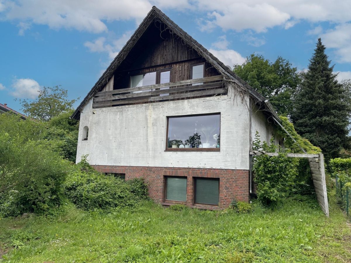 Immobilienangebot - Molfsee - Alle - Vermietetes, sanierungsbedürftiges EFH mit ELW im beliebten Molfsee