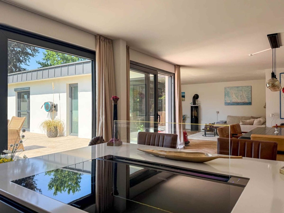 Immobilienangebot - Gettorf - Alle - Wohnen auf höchstem Niveau – moderner Bungalow mit Feldblick