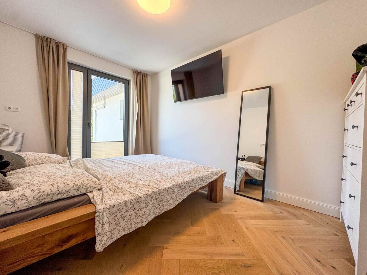 Immobilienangebot - Gettorf - Alle - Wohnen auf höchstem Niveau – moderner Bungalow mit Feldblick