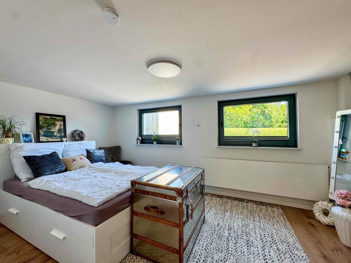 Immobilienangebot - Gettorf - Alle - Wohnen auf höchstem Niveau – moderner Bungalow mit Feldblick