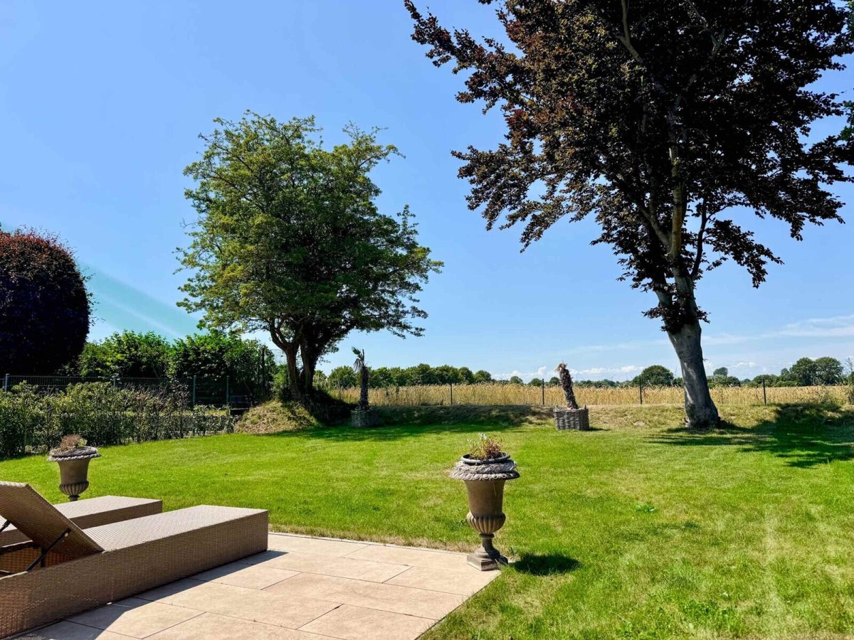Immobilienangebot - Gettorf - Alle - Wohnen auf höchstem Niveau – moderner Bungalow mit Feldblick
