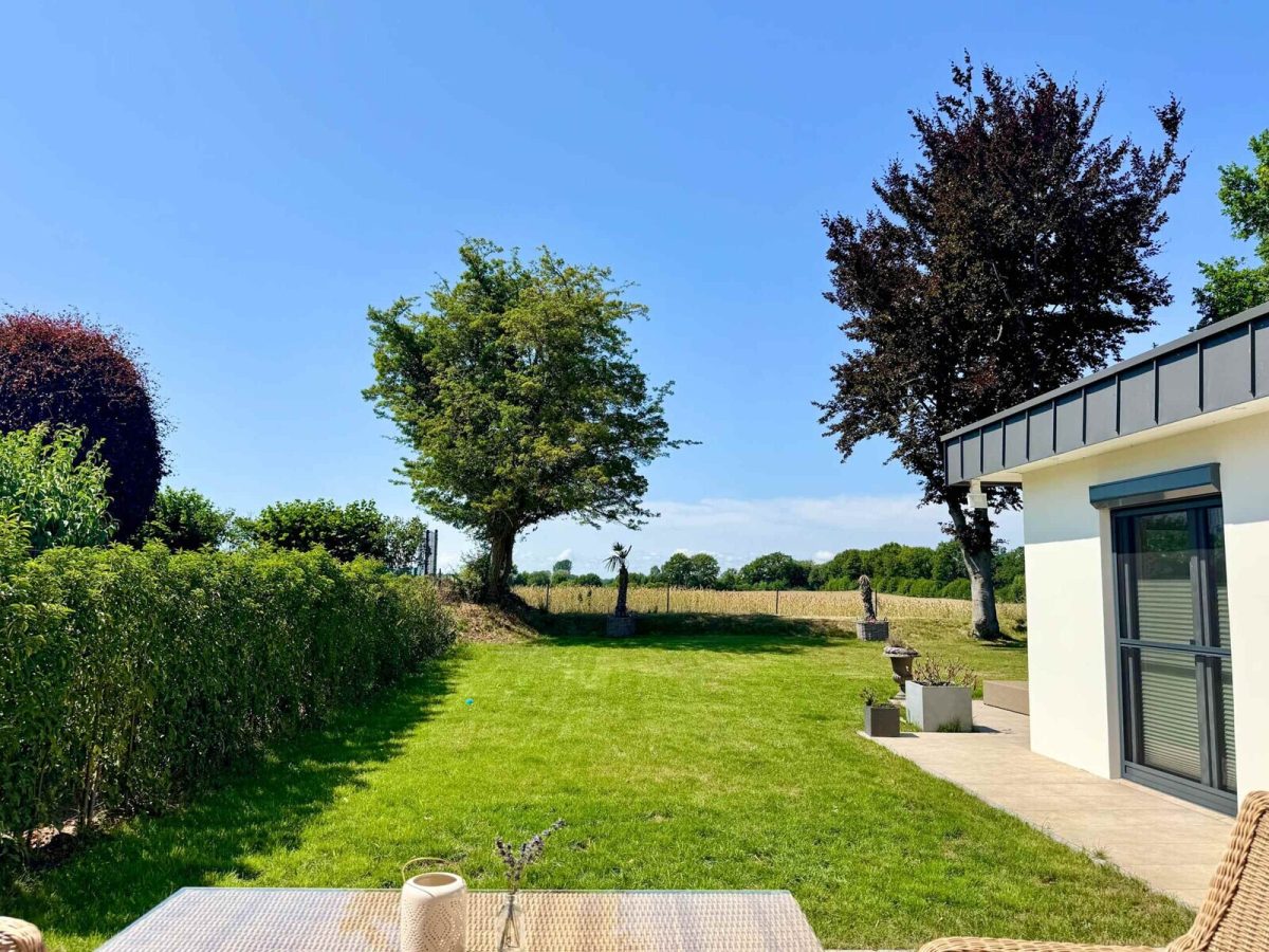 Immobilienangebot - Gettorf - Alle - Wohnen auf höchstem Niveau – moderner Bungalow mit Feldblick