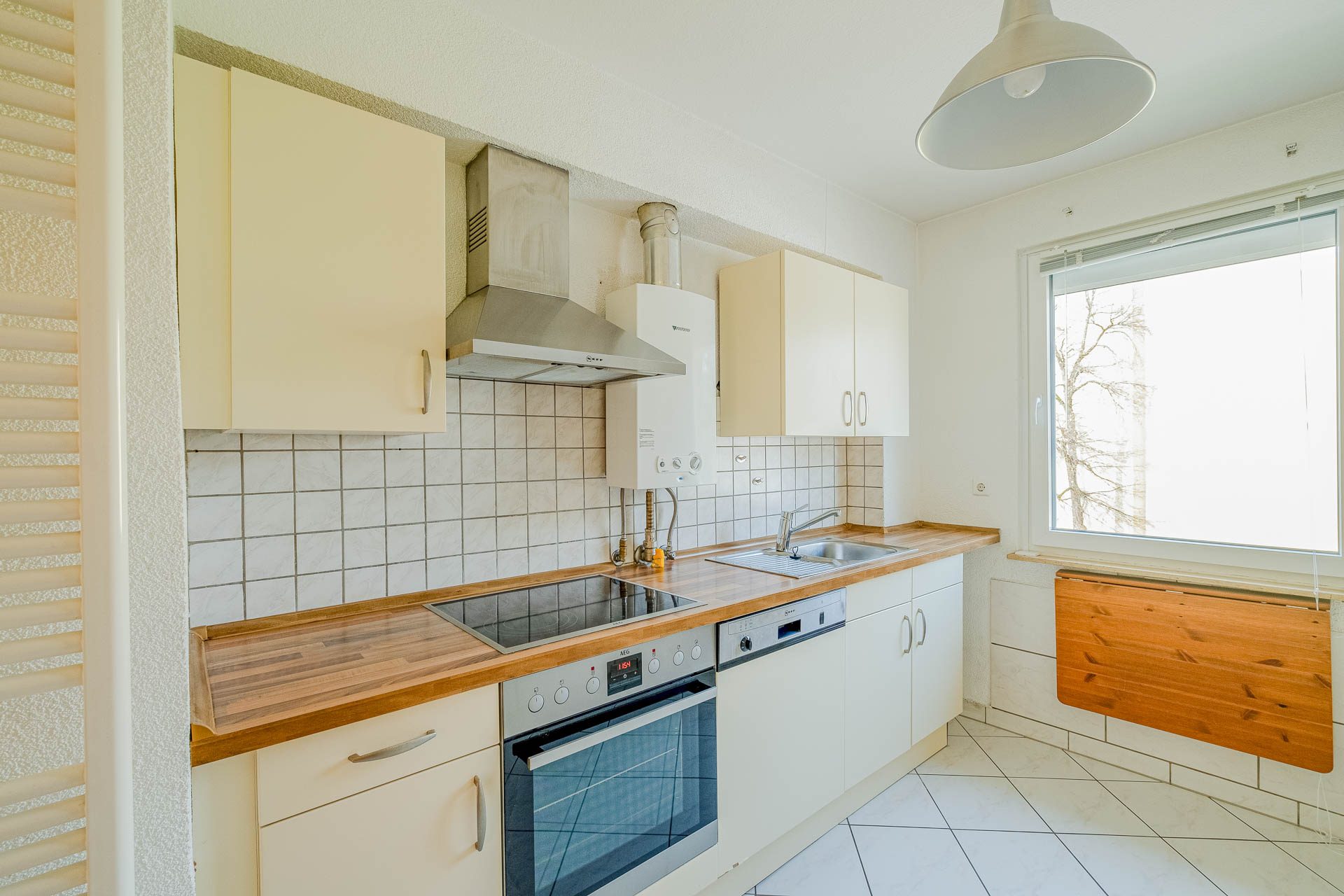 Immobilienangebot - Heidelberg - Alle - Auf Erbpachtgrundstück: 3-Parteienhaus mit Garten, Garagen und vielfältigen Nutzungsmöglichkeiten