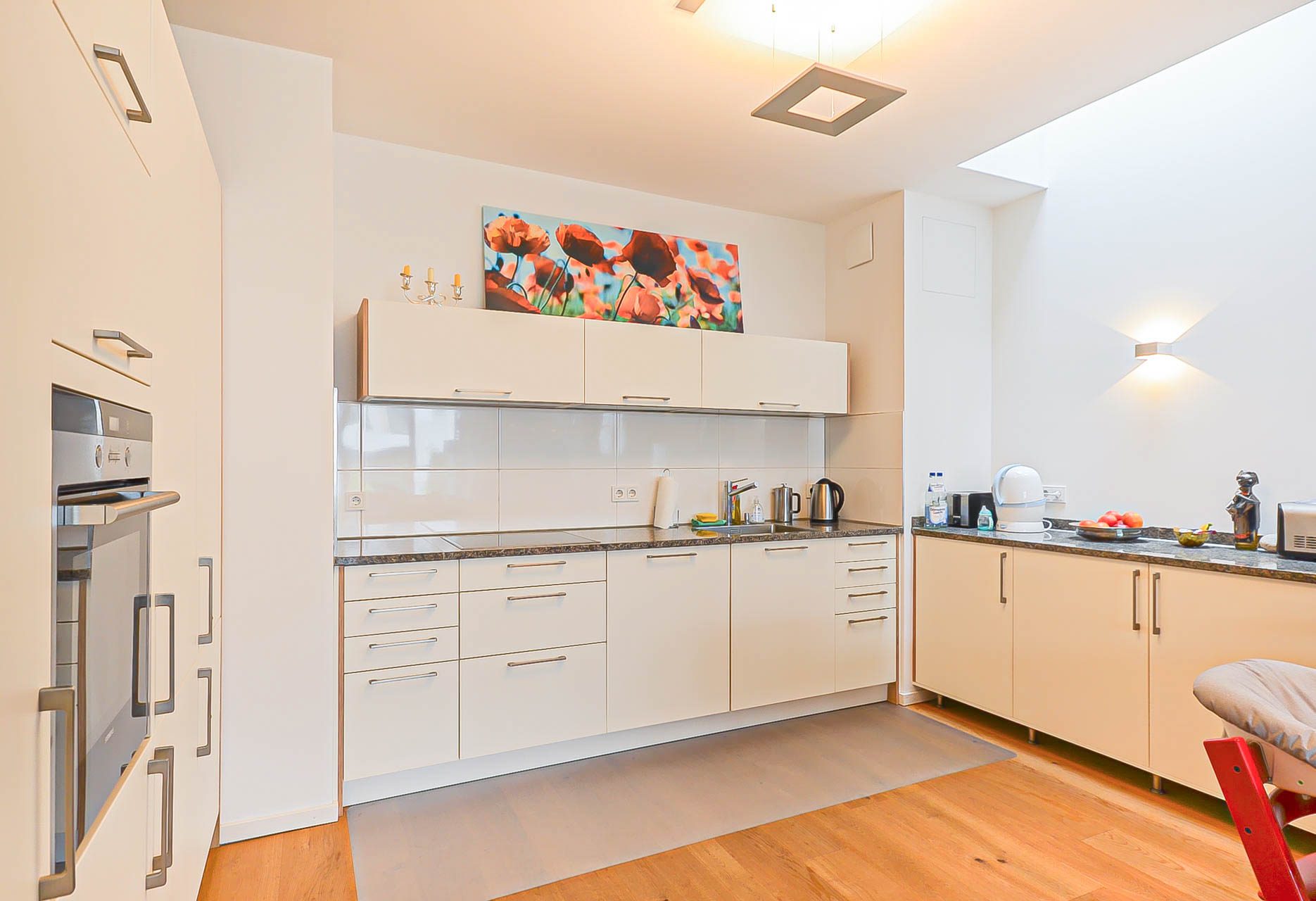 Immobilienangebot - Heidelberg - Alle - Attraktive Crossover-Wohnung mit TG-Stellplatz, Balkon, Atrium und Dachterrasse im Reihenhausstil