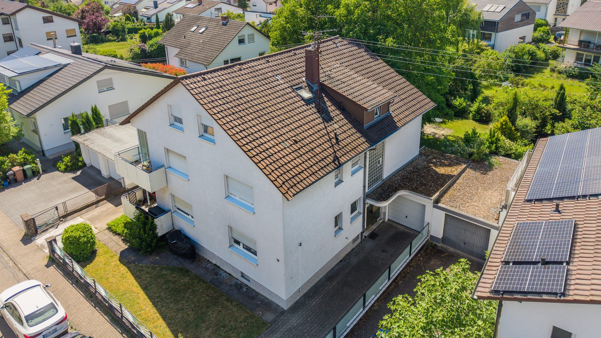 Immobilienangebot - Wiesloch - Alle - Top Kapitalanlage mit Entwicklungspotential: Dreifamilienhaus mit zwei Garagen in attraktiver Lage