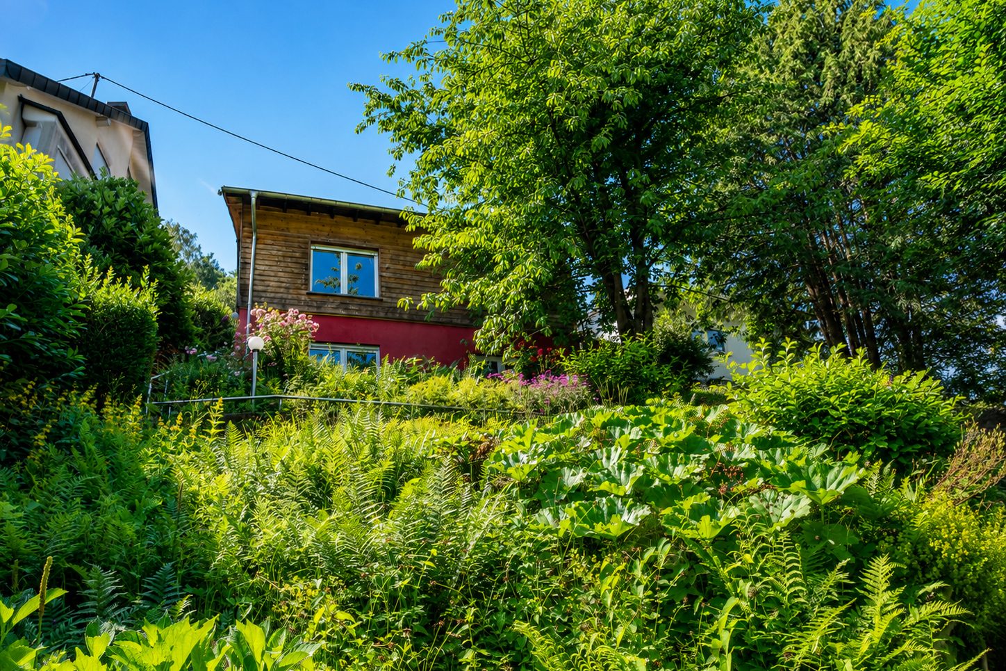 Immobilienangebot - Schönau - Alle - Naturoase in Schönau: Einfamilienhaus mit Einliegerwohnung, großem Garten und Sonnenterrasse