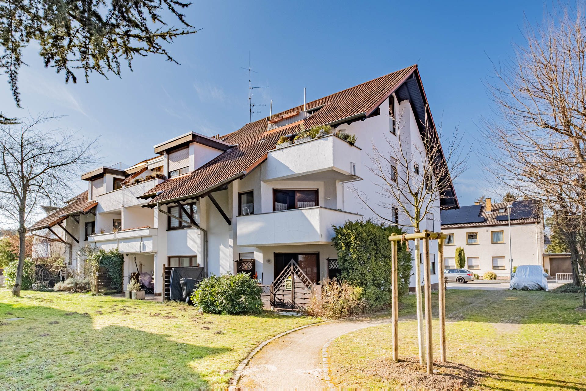 Immobilienangebot - Sandhausen - Alle - Sandhausen: Idyllisch gelegene 3-Zimmer-Wohnung mit Balkon und 2 Stellplätzen