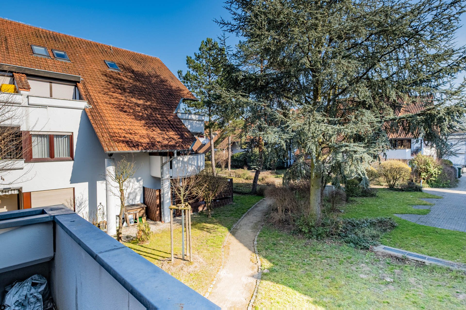 Immobilienangebot - Sandhausen - Alle - Sandhausen: Idyllisch gelegene 3-Zimmer-Wohnung mit Balkon und 2 Stellplätzen