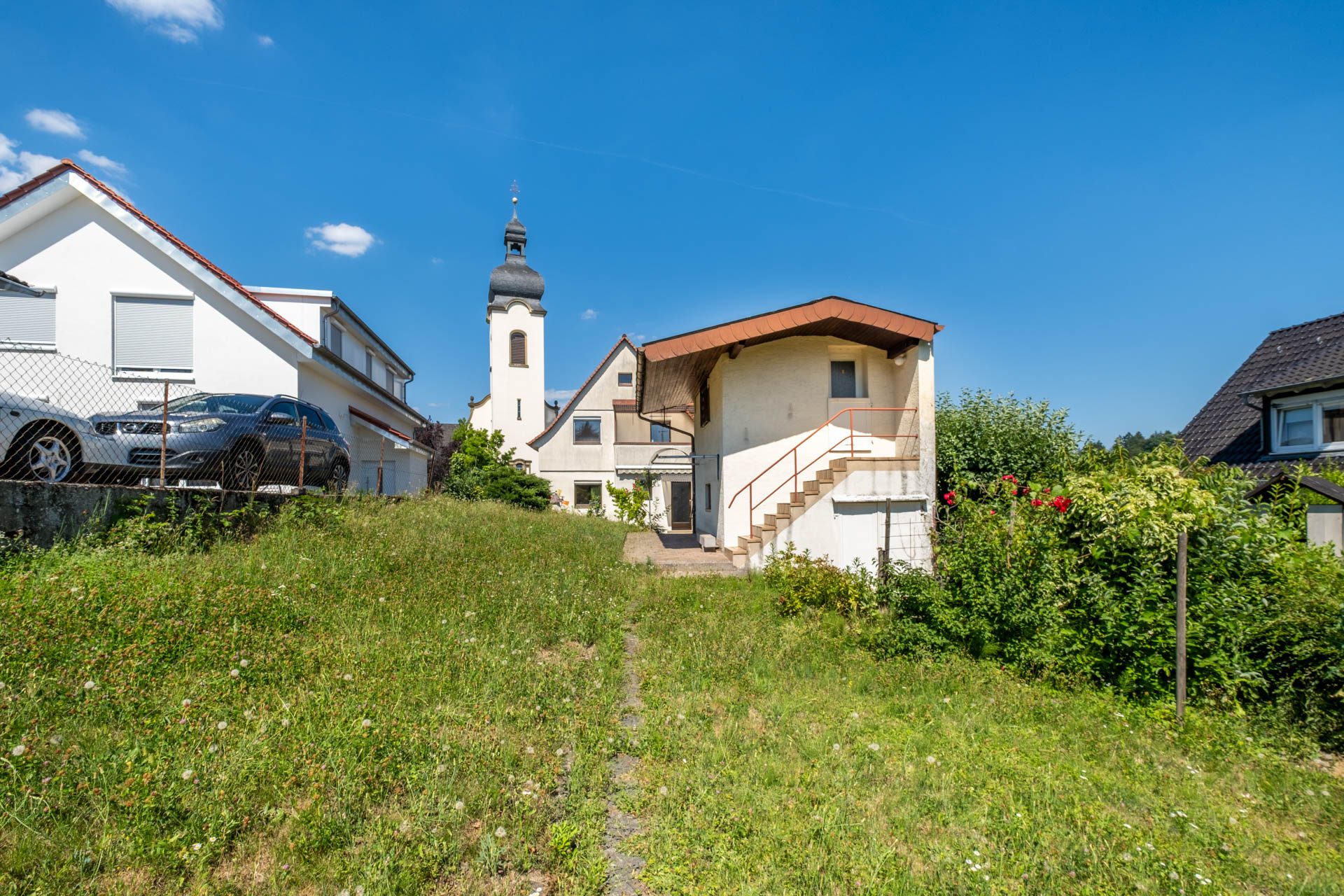 Immobilienangebot - Bammental - Alle - Klein, aber kann fein werden: Wohnhaus mit Garten, kleiner Garage und Gestaltungspotenzial