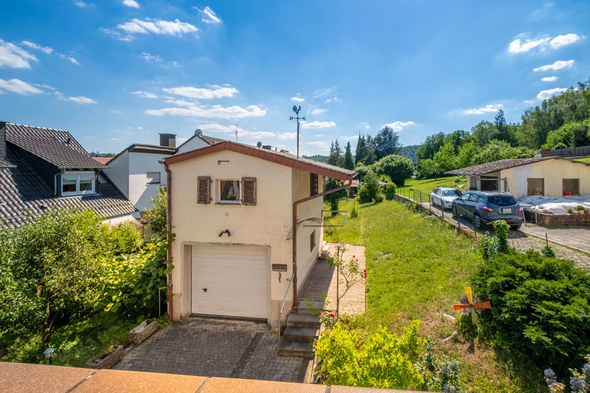 Immobilienangebot - Bammental - Alle - Klein, aber kann fein werden: Wohnhaus mit Garten, kleiner Garage und Gestaltungspotenzial
