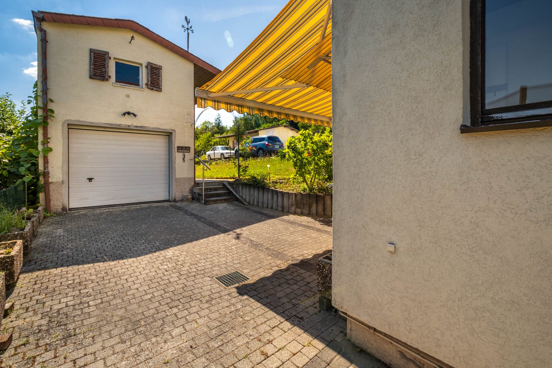 Immobilienangebot - Bammental - Alle - Klein, aber kann fein werden: Wohnhaus mit Garten, kleiner Garage und Gestaltungspotenzial
