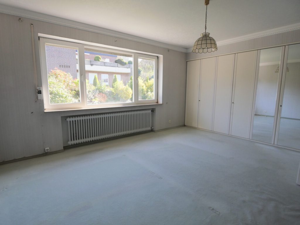 Immobilienangebot - Stolberg - Alle - Ruhiges Wohnen in Stolberg: Architektonisch spannende Doppelhaushälfte mit Garten & viel Potenzial!