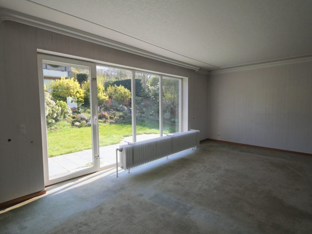 Immobilienangebot - Stolberg - Alle - Ruhiges Wohnen in Stolberg: Architektonisch spannende Doppelhaushälfte mit Garten & viel Potenzial!