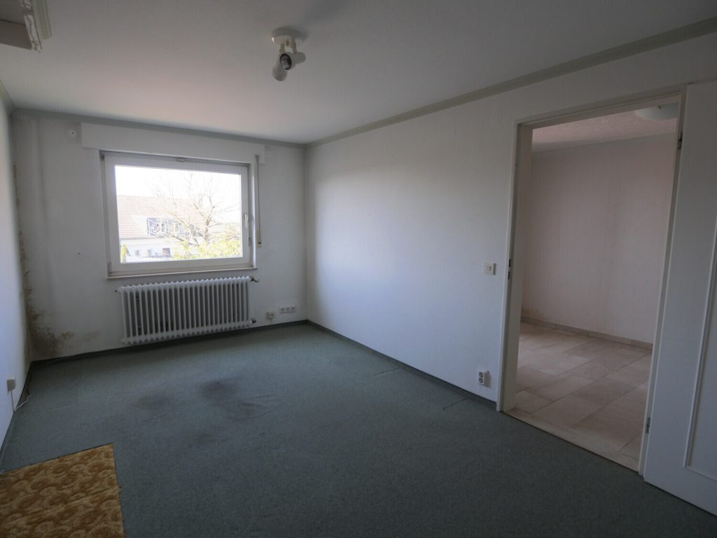 Immobilienangebot - Stolberg - Alle - Ruhiges Wohnen in Stolberg: Architektonisch spannende Doppelhaushälfte mit Garten & viel Potenzial!