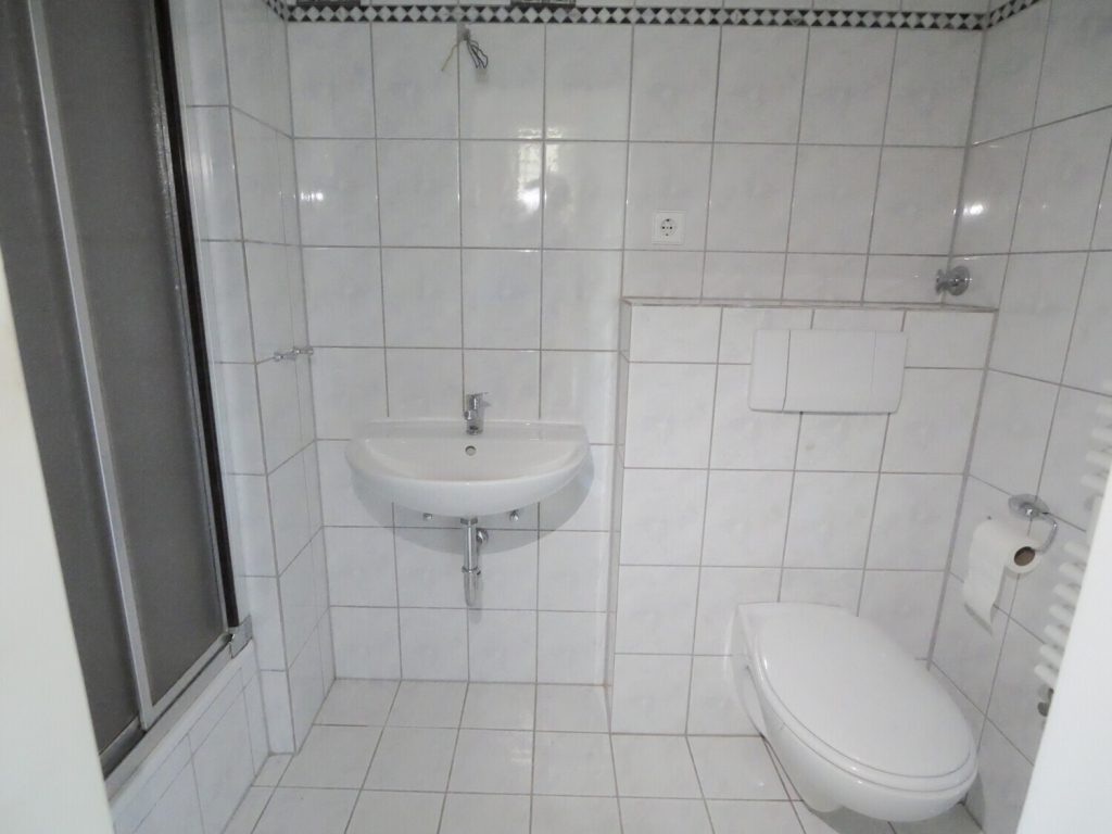 Immobilienangebot - Stolberg - Alle - Ruhiges Wohnen in Stolberg: Architektonisch spannende Doppelhaushälfte mit Garten & viel Potenzial!