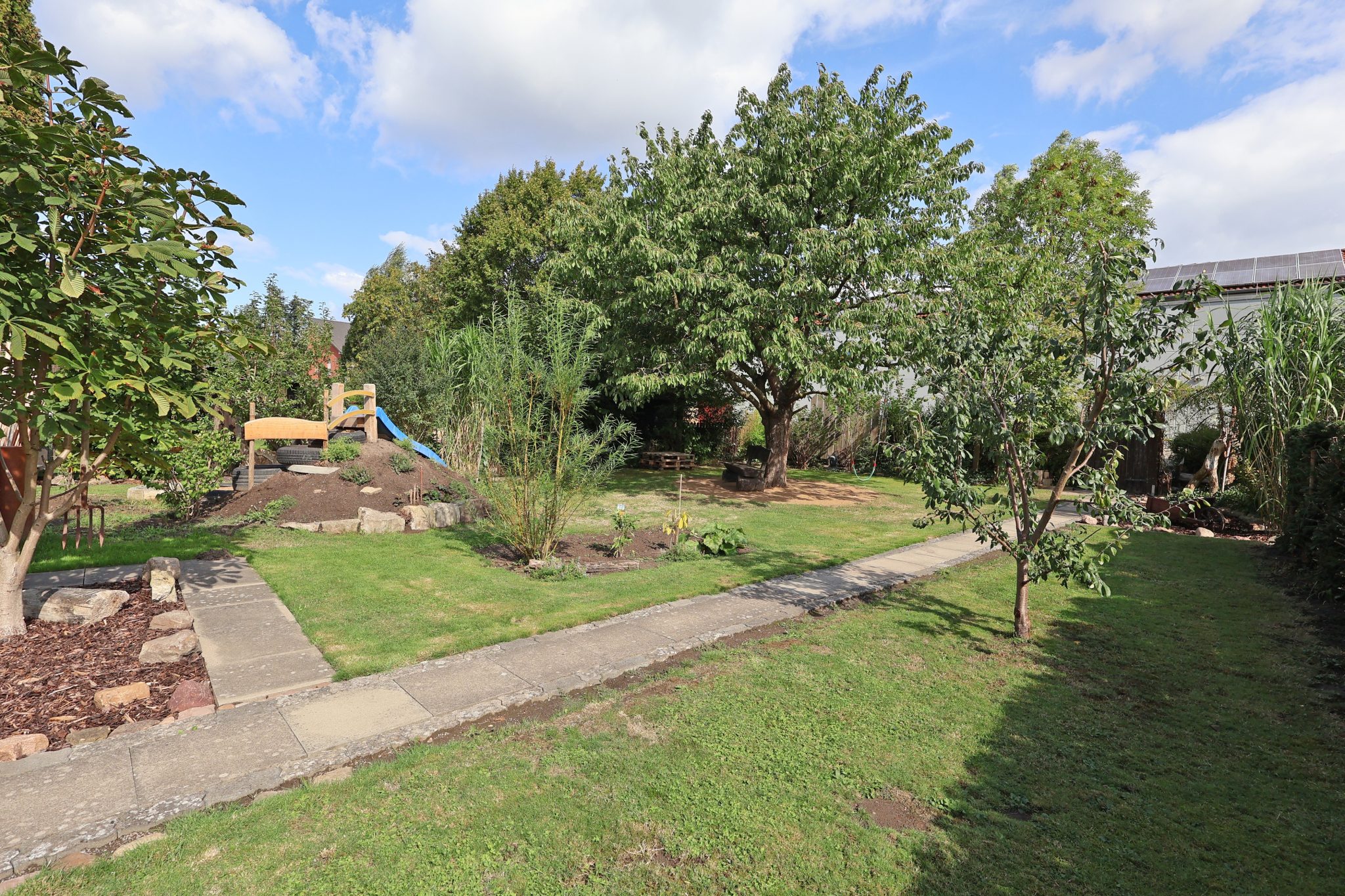Immobilienangebot - Hagenburg - Alle - Viel Raum. Viel Grün. Viel Lebensqualität. Großzügige Eigentumswohnung mit eigenem Garten