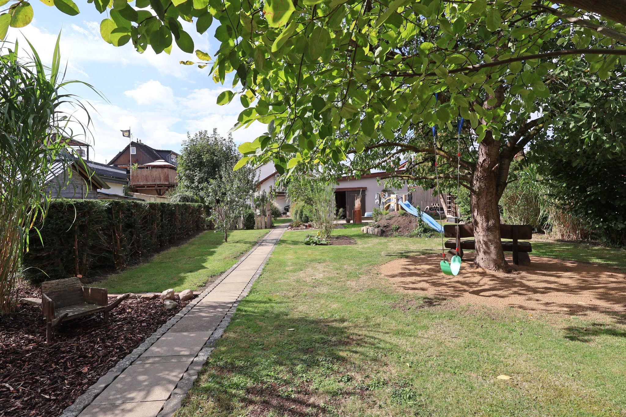 Immobilienangebot - Hagenburg - Alle - Viel Raum. Viel Grün. Viel Lebensqualität. Großzügige Eigentumswohnung mit eigenem Garten