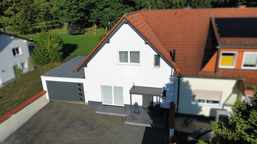 Immobilienangebot - Much - Haus - Modernisiertes Zuhause mit überdachter Terrasse und Doppelgarage