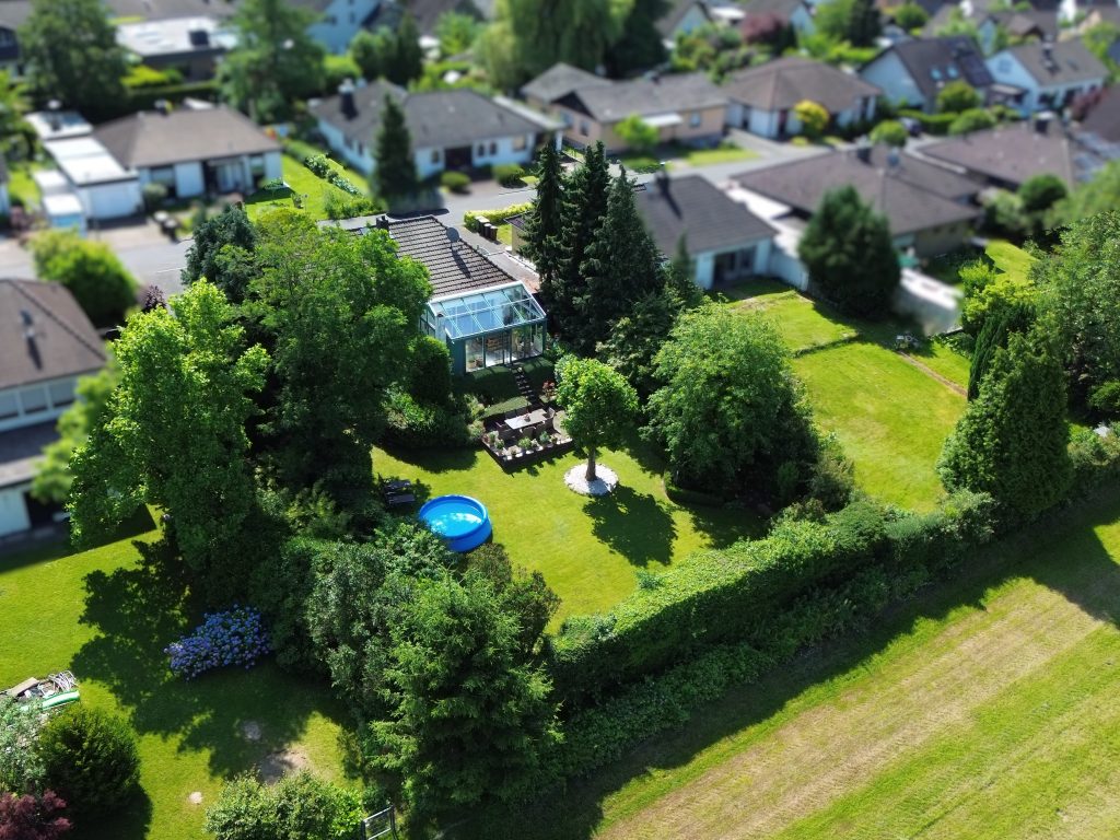 Immobilienangebot - Much - Haus - Bungalow mit Kamin und Wintergarten in Bestlage von Much - Unverbauter Fernblick inklusive
