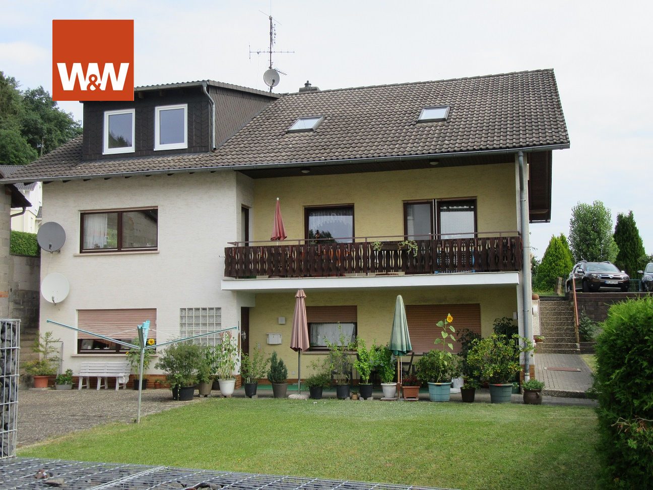 Immobilienangebot - Marburg / Gisselberg - Alle - Mehrfamilienhaus mit 3 großzügigen Wohnungen, Garten, Garagen- und Nebengebäude in schöner
Lage von Marburg-Gisselberg